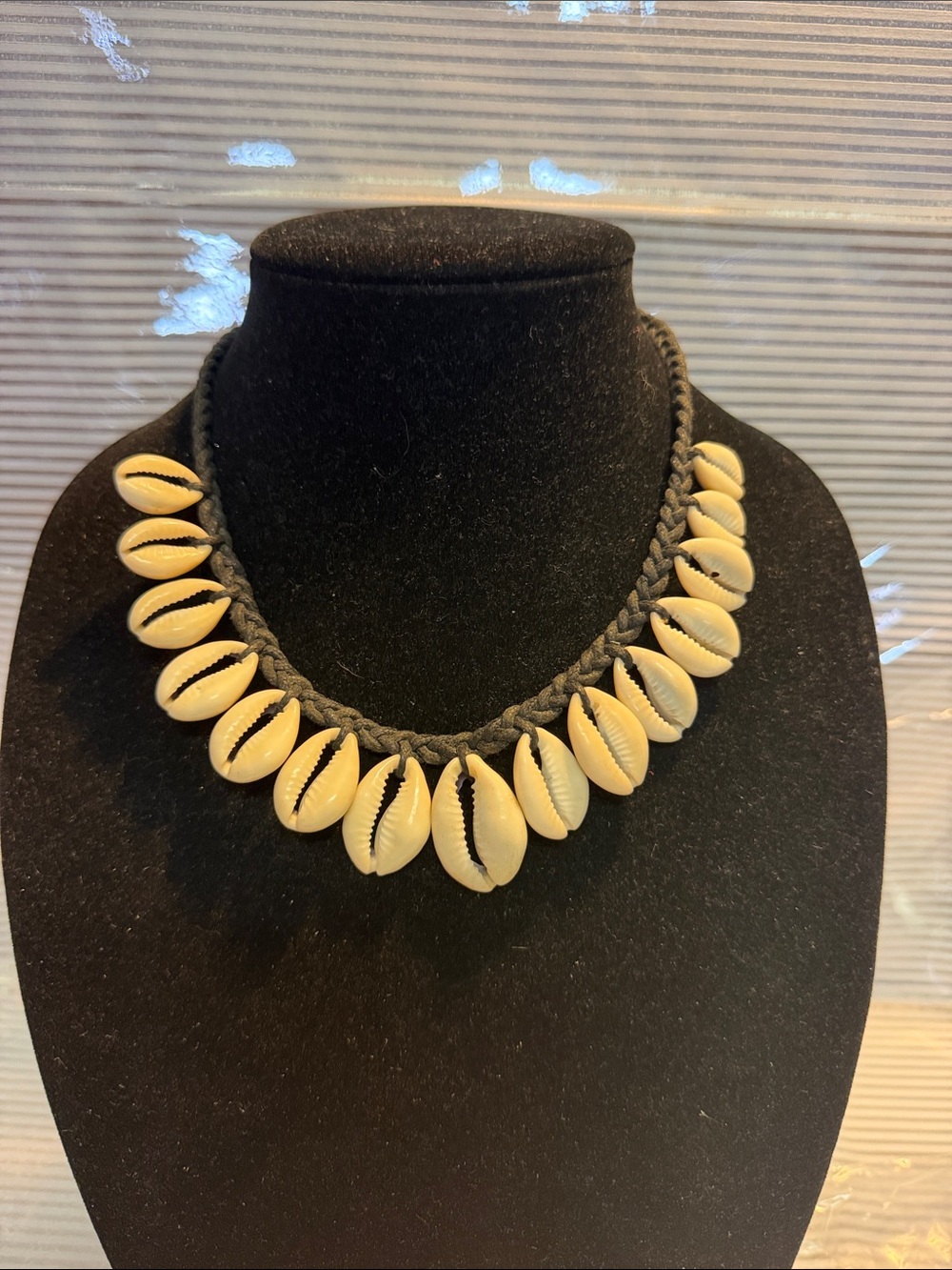 Source Unknown Black Braided Cowrie Shell Necklace - Cream Shells